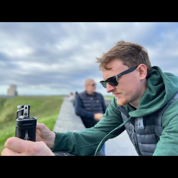 The Cliffs of Moher will turn anyone into a photographer, George included.