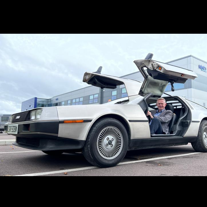 GSK's VP & Head of Business Development, Dave Gibson contemplating a cruise in the DeLorean.