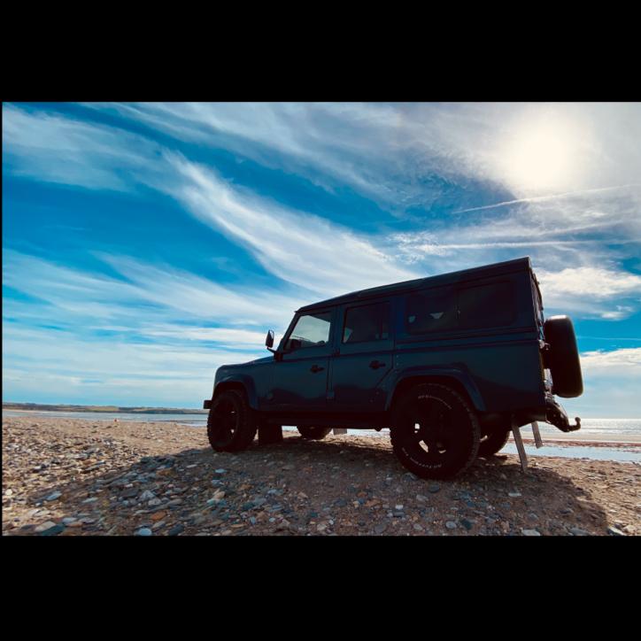 Getting a few glamor shots of the Land Rover at Guillamene Cove.