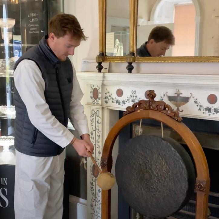 Time's up. George rings the gong in Waterford's Medieval Museum.