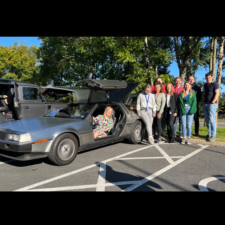 The Waters team checks out the DeLorean.