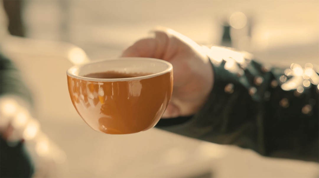 The big man needs a little cup of coffee.
