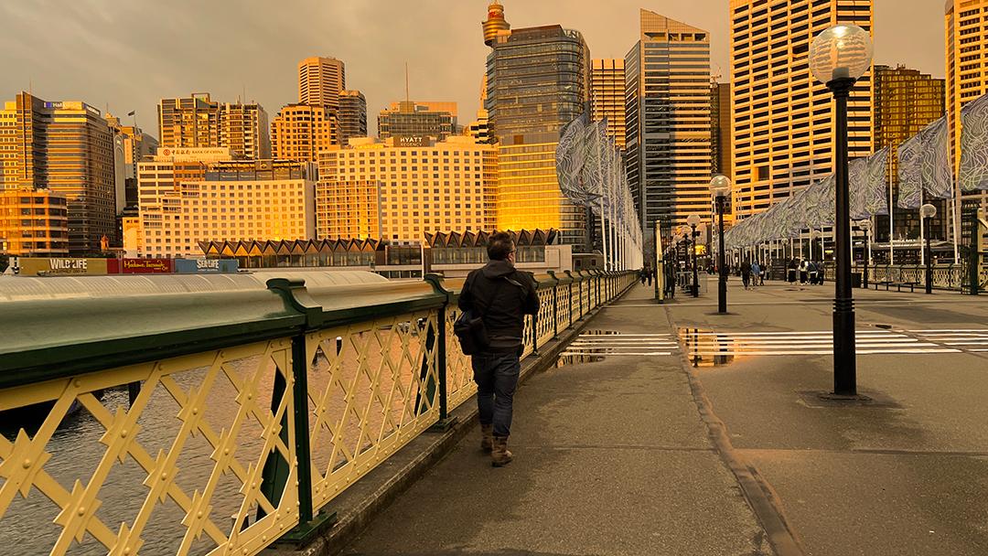 Downtown Melbourne is bustling at sunset.