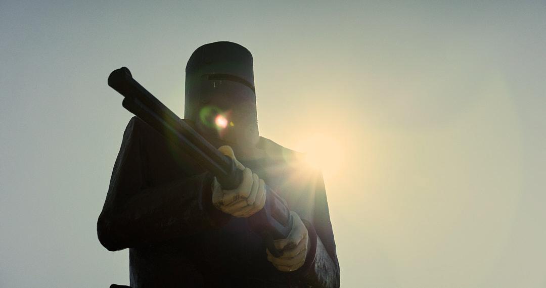 Bushranger Ned Kelly making his last stand.