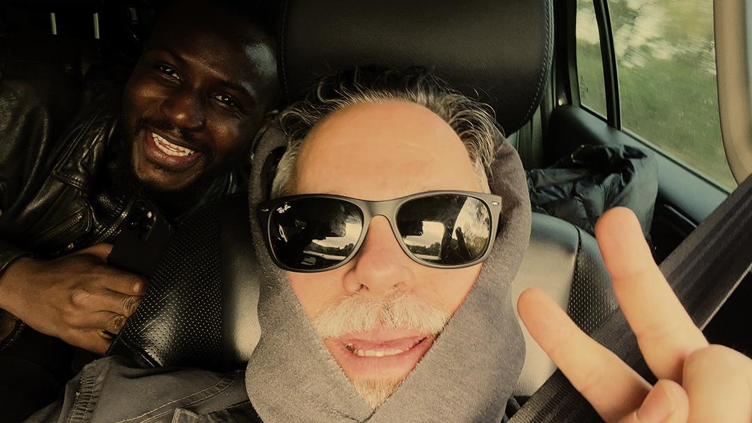 Mark and Adama snug as bugs in a rug.