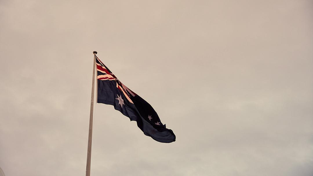 The Commonwealth Blue Ensign waving in the Sydney winds.