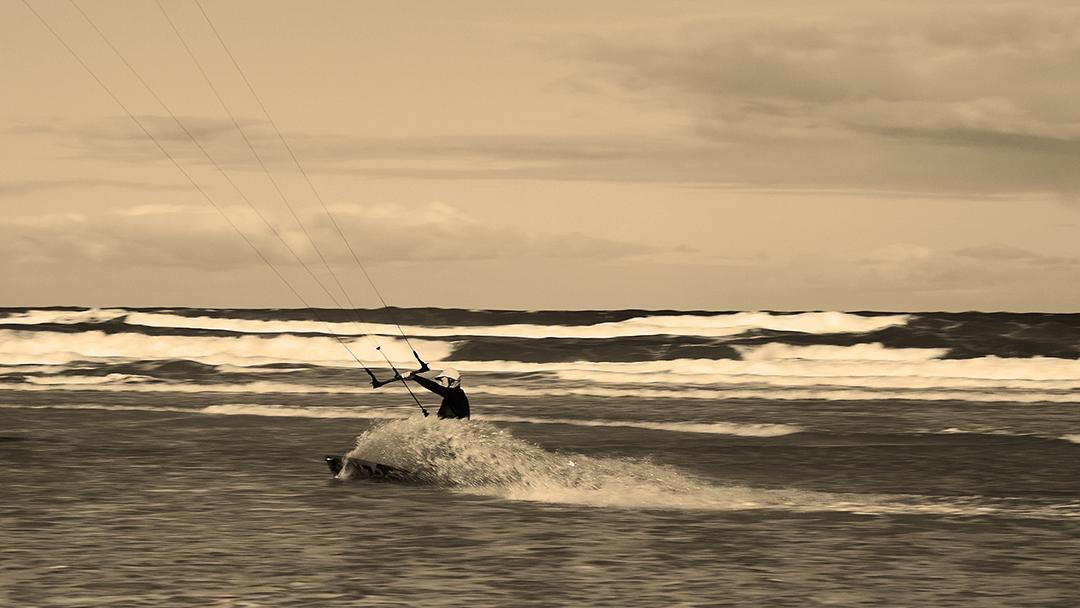 A kite surfer on Anna Bay.