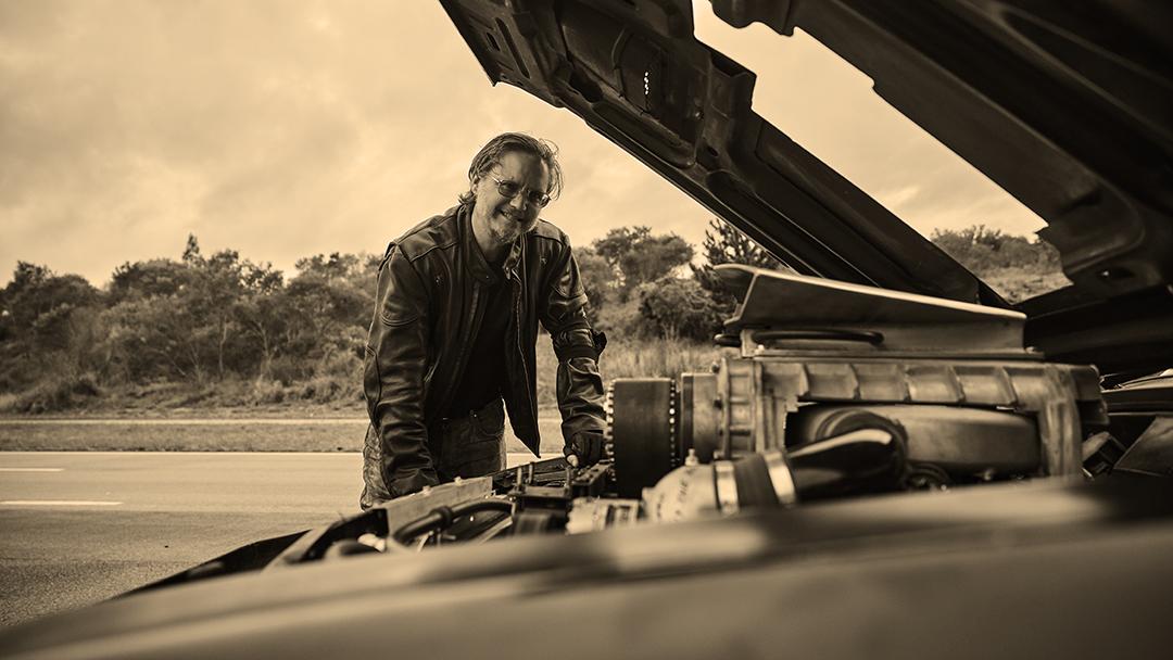 A guy in a leather jacket always looks like he knows his way around an engine.